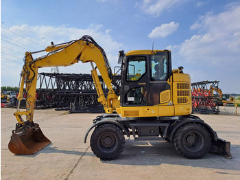 Bager na kotačima KOMATSU PW118