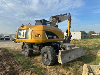 Bager na kotačima Caterpillar M 316D: slika Bager na kotačima Caterpillar M 316D