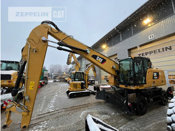 Stroj za rukovanje otpadom CATERPILLAR MH3022