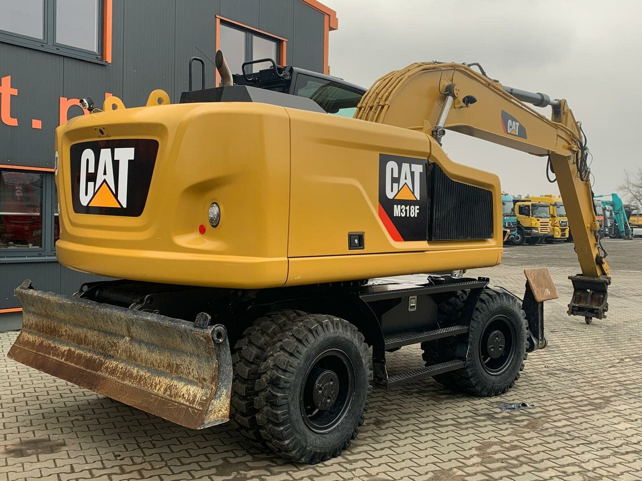 Novi Bager na kotačima CAT M318F Mobilbagger *5.845 h *Schnellwechsel: slika Novi Bager na kotačima CAT M318F Mobilbagger *5.845 h *Schnellwechsel