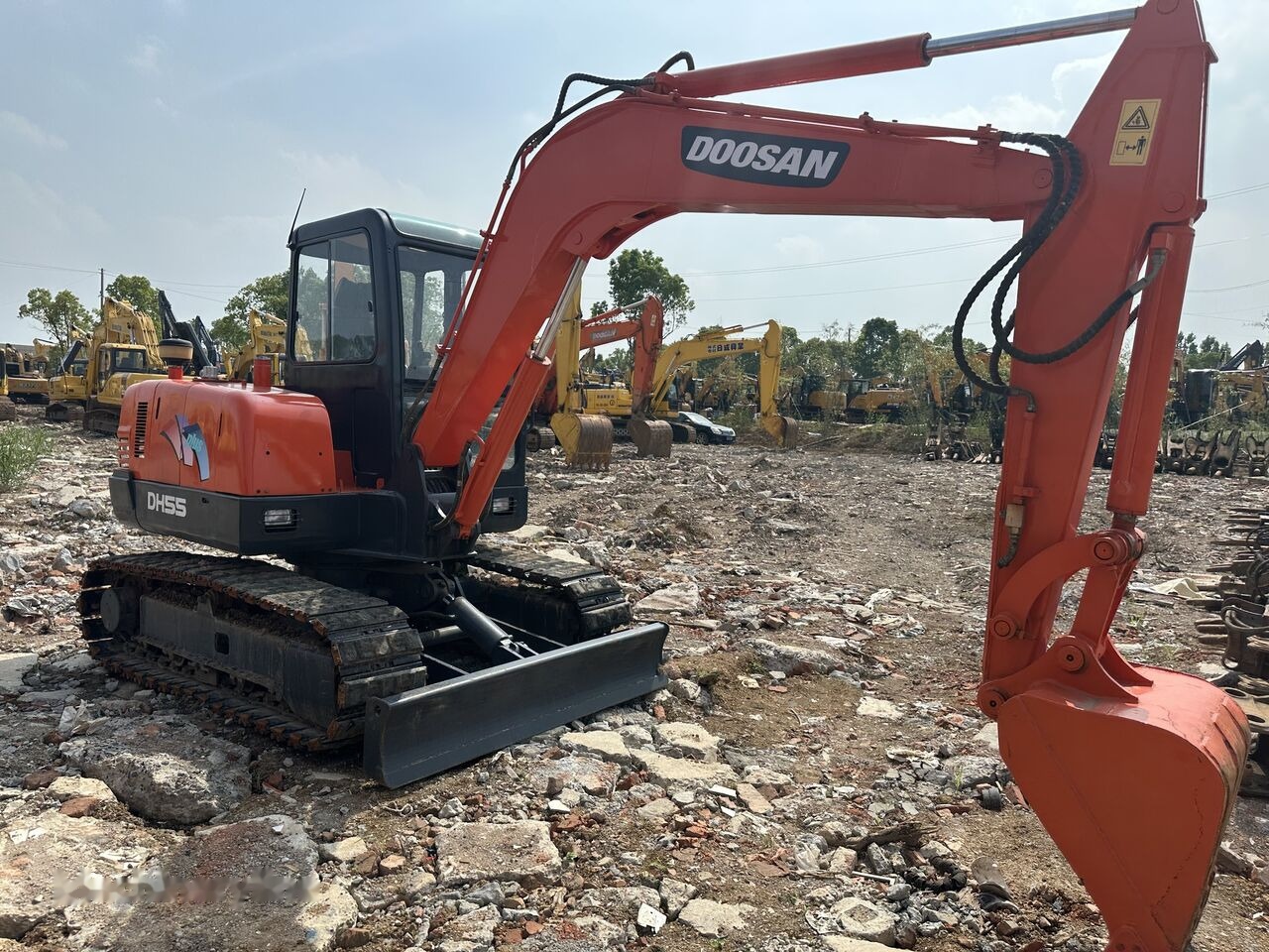 Zakup Doosan DH55 Doosan DH55: slika Zakup Doosan DH55 Doosan DH55