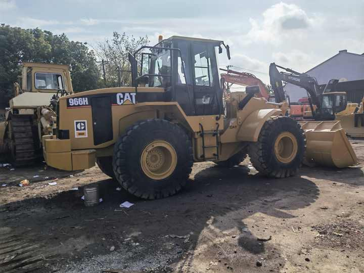 Utovarivač na kotačima Original Used CAT 966H Wheel Loader Cheap Price Caterpillar 966H Front End Loader in shanghai yard: slika Utovarivač na kotačima Original Used CAT 966H Wheel Loader Cheap Price Caterpillar 966H Front End Loader in shanghai yard