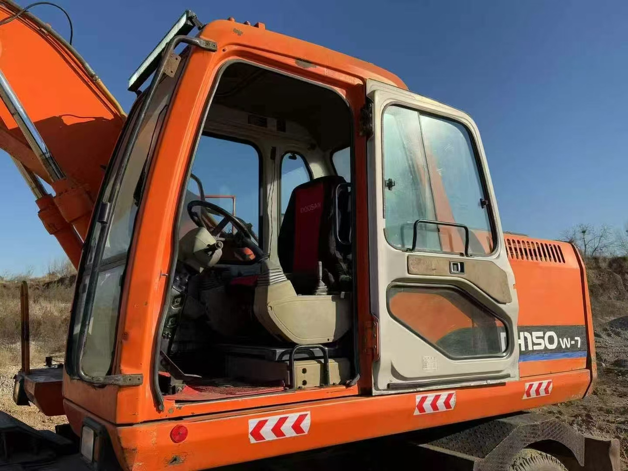 Bager na kotačima doosan Doosan dh150w-7 wheel excavator: slika Bager na kotačima doosan Doosan dh150w-7 wheel excavator