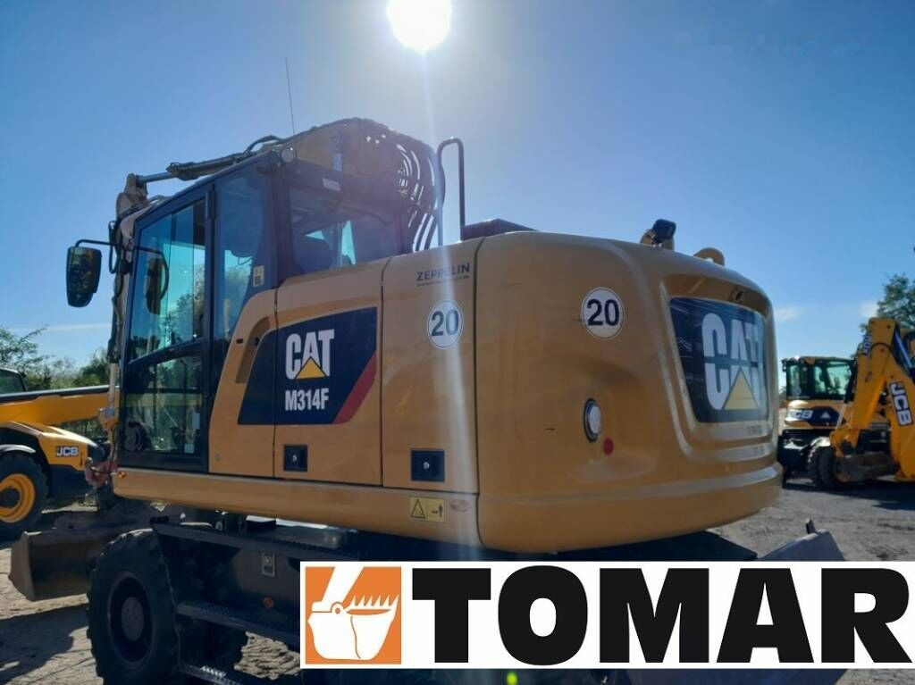 Bager na kotačima Caterpillar M 314 F: slika Bager na kotačima Caterpillar M 314 F