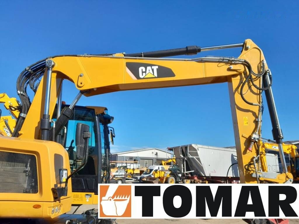 Bager na kotačima Caterpillar M 314 F: slika Bager na kotačima Caterpillar M 314 F