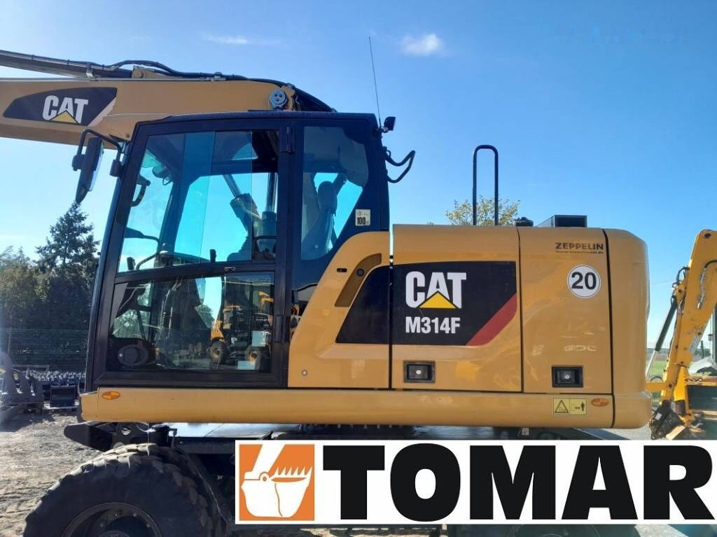 Bager na kotačima Caterpillar M 314 F: slika Bager na kotačima Caterpillar M 314 F